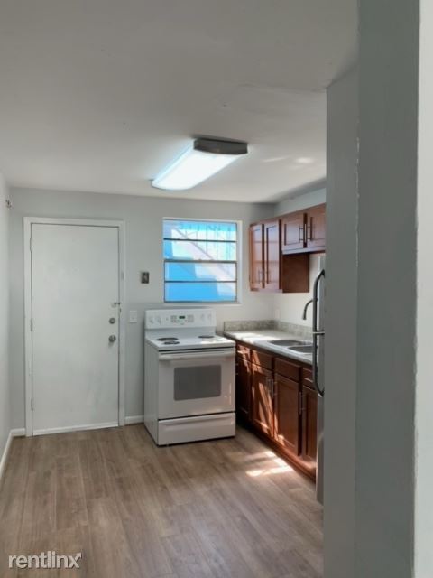 Building Photo - 2 br, 1 bath 4plex - 1006 West 25th Street 1