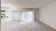 This 860 square foot apartment, located at 2221 Prior Rd, Apt. C in Wilmington, DE, offers a practical and comfortable living space. The single-story layout comprises two bedrooms, one bathroom, and a functional kitchen. The primary bedroom is generously sized at 200 square feet, providing ample space for relaxation and storage.

The kitchen is equipped with modern appliances, including a microwave, gas stove, and dishwasher. It features wooden cabinetry and a granite countertop, offering both style and functionality. Large windows throughout the apartment allow for plenty of natural light, creating a bright and airy atmosphere.

The living areas are finished with neutral-toned walls and carpeted floors, providing a blank canvas for personal decor. Vertical blinds on the windows offer privacy and light control. The bathroom is fitted with a standard tub-shower combination and includes built-in storage.

Storage solutions are abundant, with spacious closets featuring shelving units. The apartment's layout, as seen in the 3D floor plan, shows an efficient use of space, making it ideal for individuals or small families seeking a comfortable living environment in Wilmington.