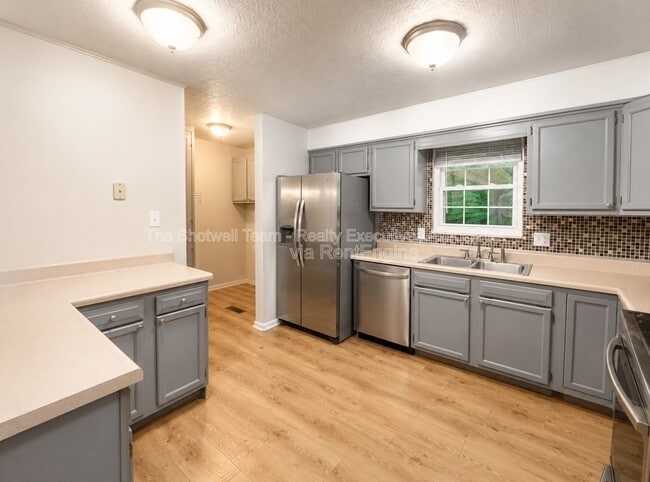Building Photo - 11104 Hughlan Dr