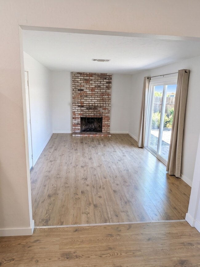 Family Room with access to backyard and patio. - 3006 Campbell Pl