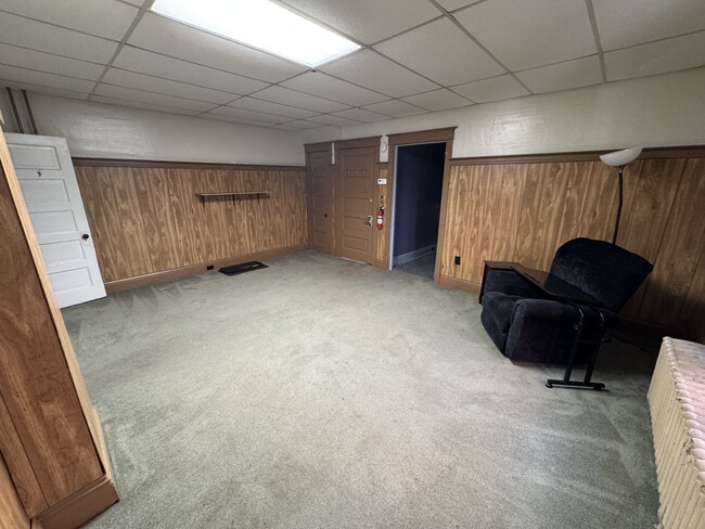 Main living area, view back to bedroom - 216 E Franklin St