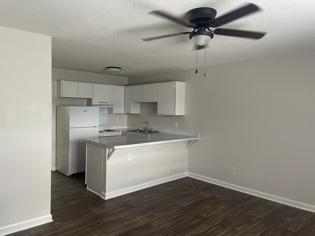 Kitchen With Breakfast Bar - Guilford Place Apartments.