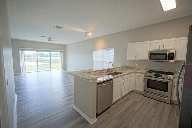 Building Photo - 9468 Leatherwood Ave