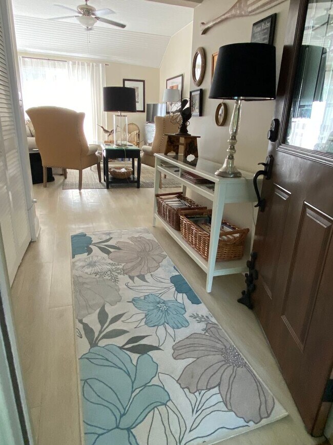 Building Photo - Home on East Bay – Impeccably Furnished Of...