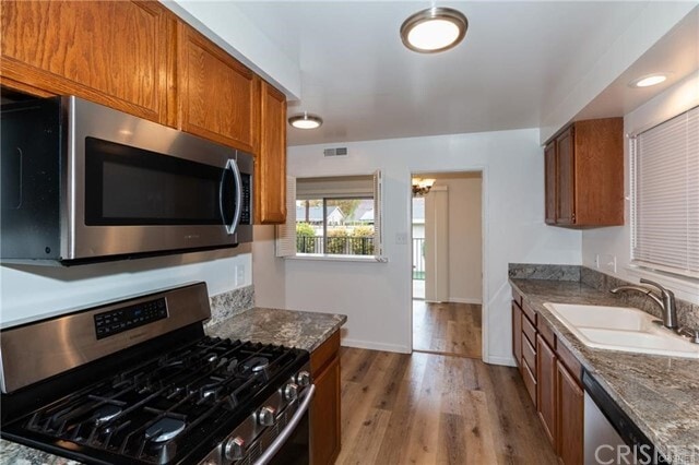 Building Photo - 6716 Woodlake Ave