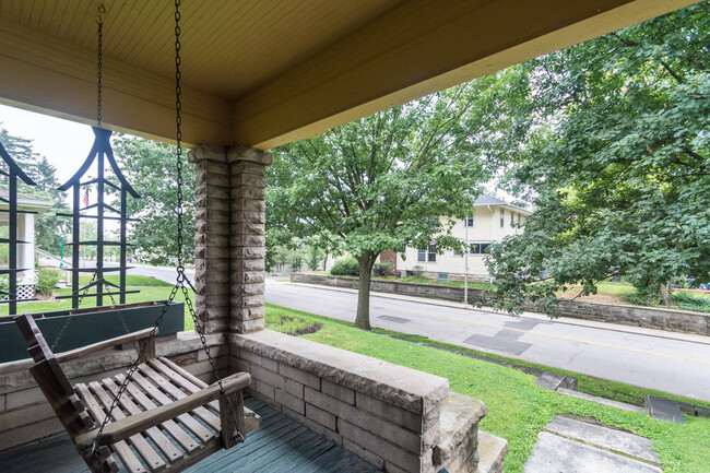 View of 10th Street from front porch - 715 E 10th St