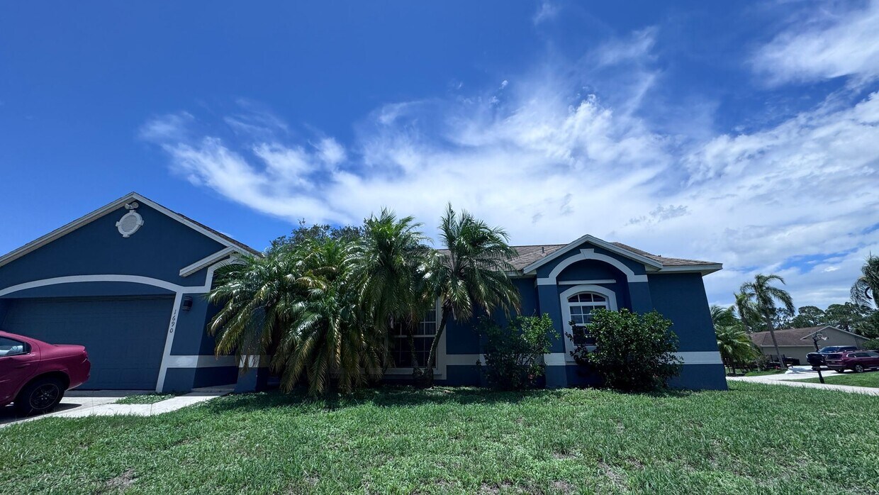 Primary Photo - Spacious 4-Bedroom Home in NW Palm Bay – A...