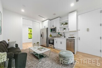 Building Photo - Brand New 3 Bed 2 Bath with W/D & Terrace!