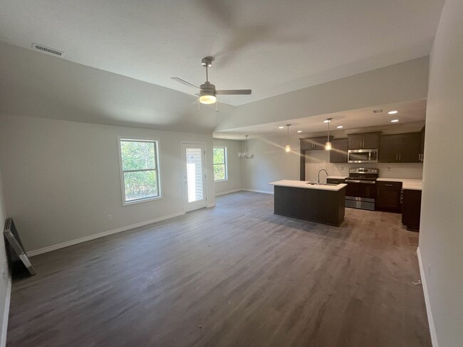 Building Photo - BRAND-NEW 3-bedroom, 2-bath home with Spri...