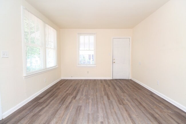 Building Photo - 2BR Cottage Home with LVP Flooring Throughout, Bonus Sunroom, Covered Parking & Low-Maintenance L...