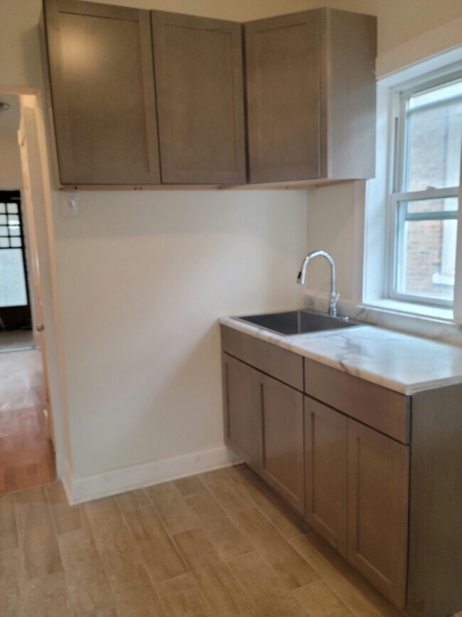 Foto del edificio - 7139 S Woodlawn Ave