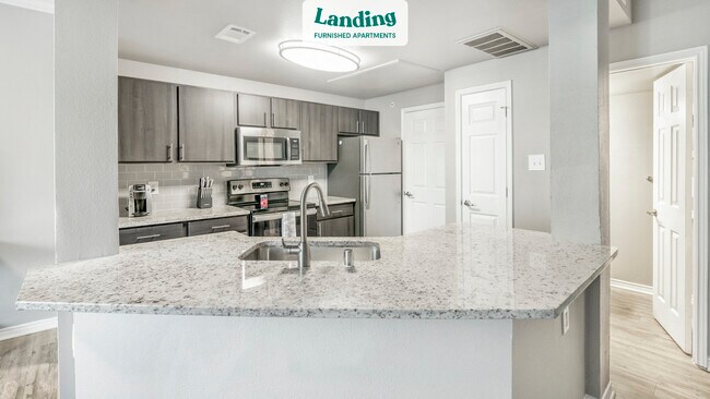 Building Photo - 1100 Hidden Ridge Dr