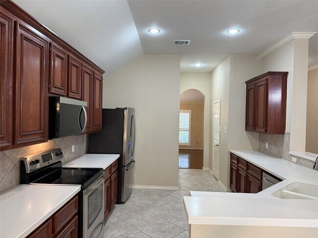 Foto del edificio - 6914 Sunflower Grove Dr
