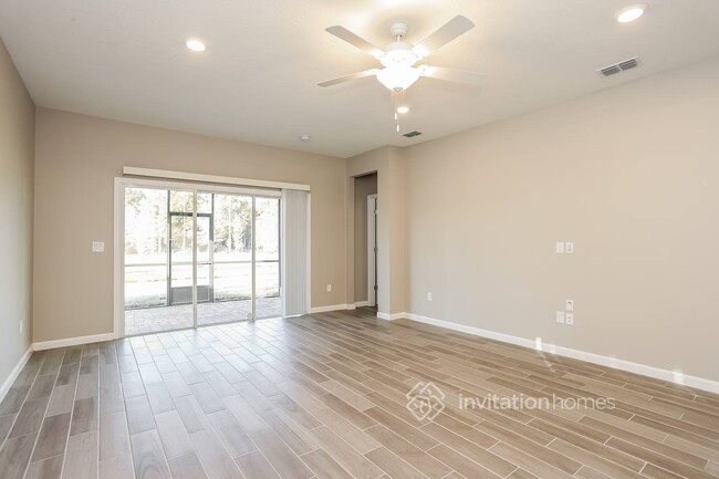 Foto del edificio - 9817 Lemon Grass Ln