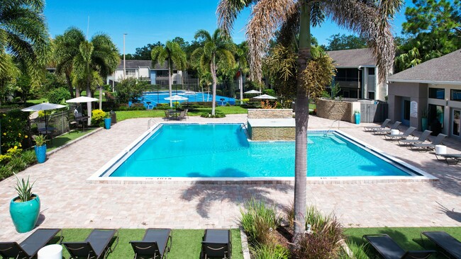 Experience the ultimate in leisure with our luxury pool and adjacent tennis courts. Enjoy a swim or a match in a beautifully landscaped setting, perfect for relaxation and recreation. - Harper Grand