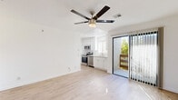 Located in the South Park neighborhood of San Diego, this well-appointed 1-bedroom, 1-bathroom unit offers a thoughtfully designed layout with modern finishes throughout. The open-concept living and kitchen area is bright and welcoming, featuring light wood-tone flooring, crisp white walls, and a ceiling fan that enhances air circulation. A sliding glass door leads to an outdoor area, filling the space with natural light and providing easy access to the exterior.

The kitchen is efficiently designed with white shaker-style cabinetry, light quartz countertops, and a full suite of stainless steel appliances including an electric range, over-the-range microwave, dishwasher, and refrigerator — offering a clean, contemporary look.

The bedroom is a comfortable retreat with light-filled windows dressed in vertical blinds, continued wood-tone flooring, a ceiling fan, and a mirrored sliding-door closet that enhances the sense of space while providing ample storage.

The bathroom features a white vanity with quartz countertop, a full tub-shower combination with built-in shelving, and consistent wood-tone flooring, maintaining the clean aesthetic found throughout the unit. Every room reflects a cohesive, modern design with an emphasis on light, functionality, and simplicity.