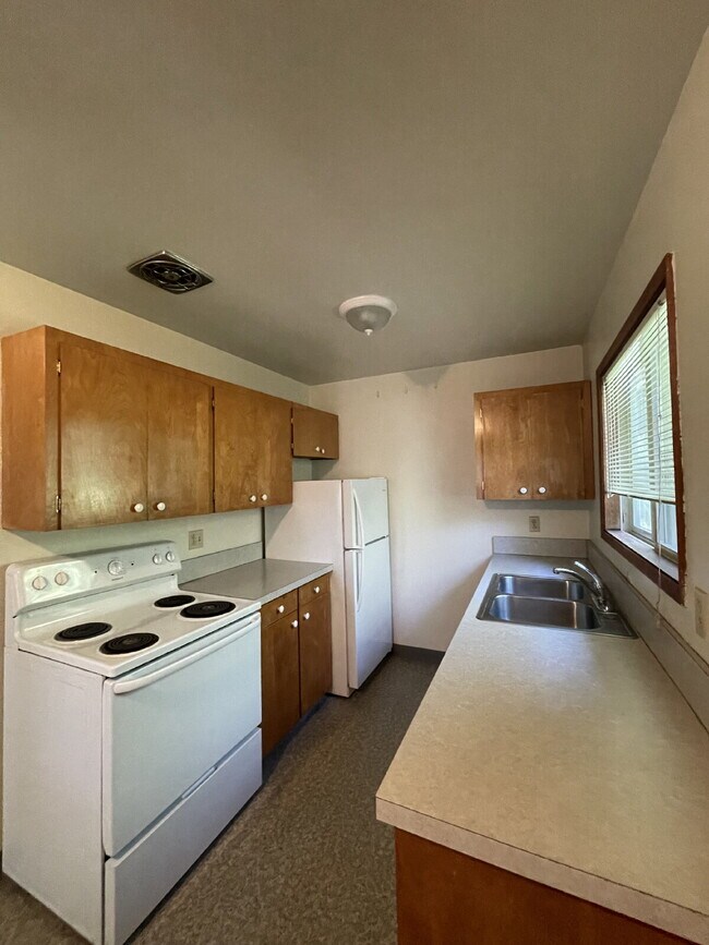 Foto del edificio - Charming 1-Bedroom Apartment with a Comfortable Layout