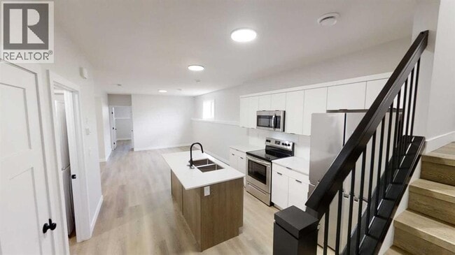 Photo du bâtiment - 10406-10129 129 Ave