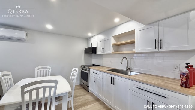 Photo du bâtiment - 171 Sloane Av