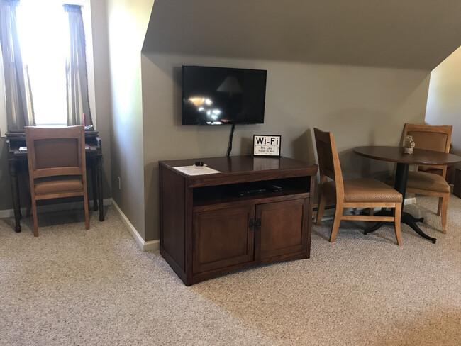 Entertainment center with dvd selection - 408 3rd Ave. E