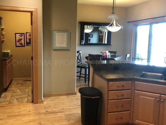 Building Photo - Spacious and Amenity 5 Bedroom, 3 Bath Home