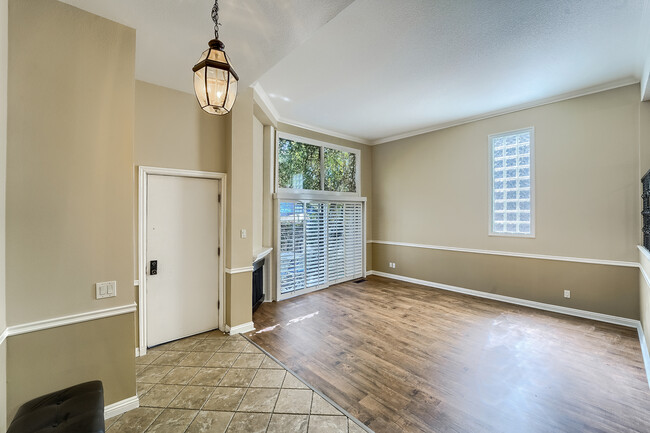 Living room towards front door and patio - 6256 Shoup Ave