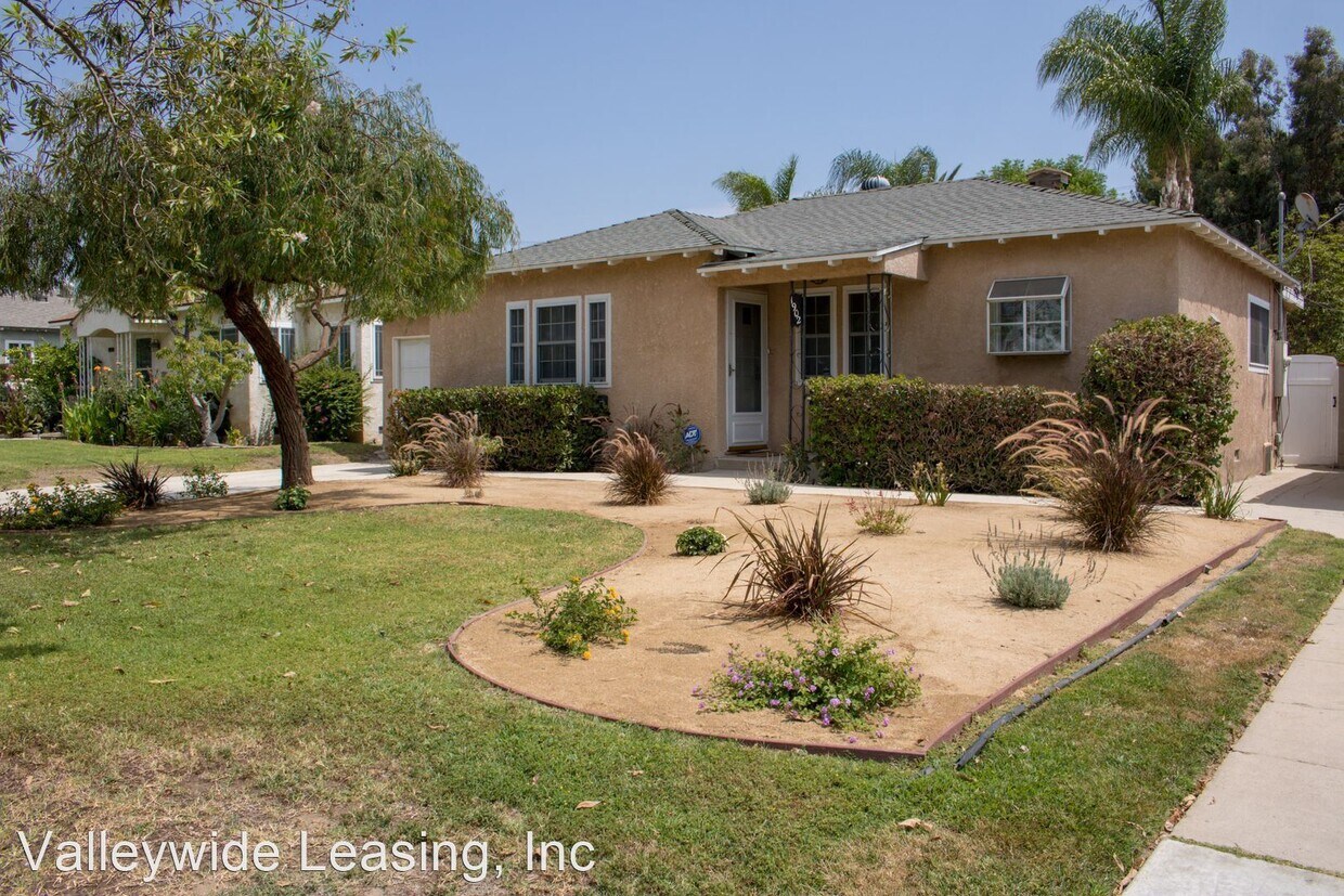 Foto principal - 4 br, 2 bath House - 1902 N Maple St