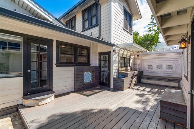 Building Photo - Fully Furnished 2-Bedroom + Loft & Serene ...