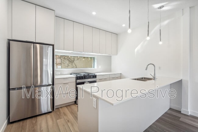 Building Photo - 9121-9165 65 Ave NW