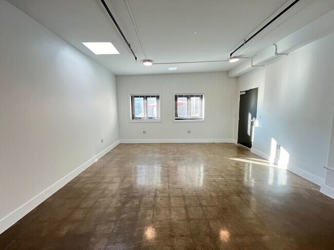 Building Photo - Modern space in historic building. Two mon...