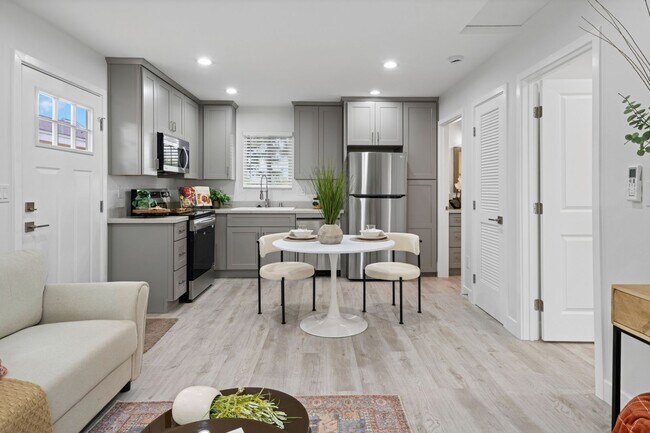 Building Photo - Introducing a charming bungalow-style unit...
