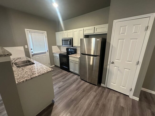 Building Photo - NEW IN MANAGEMENT - AVAILABLE NOW!