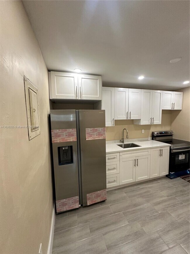 Building Photo - 234 NE 55th Terrace
