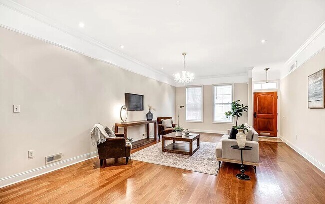 Building Photo - Stunning 5-Bedroom Home with Finished Base...