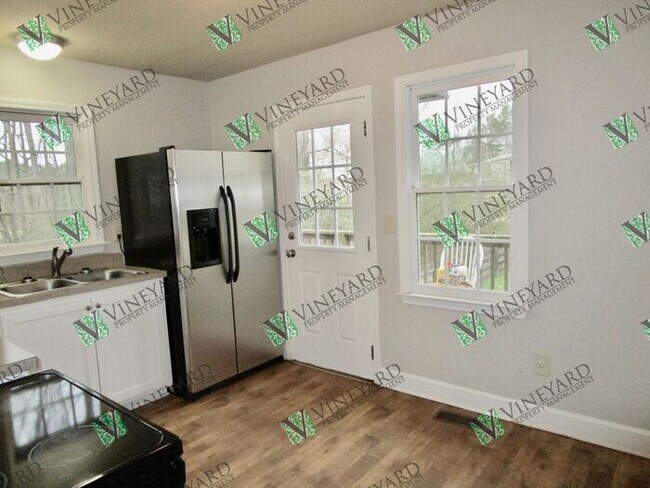 Building Photo - 8279 E Cherokee Dr