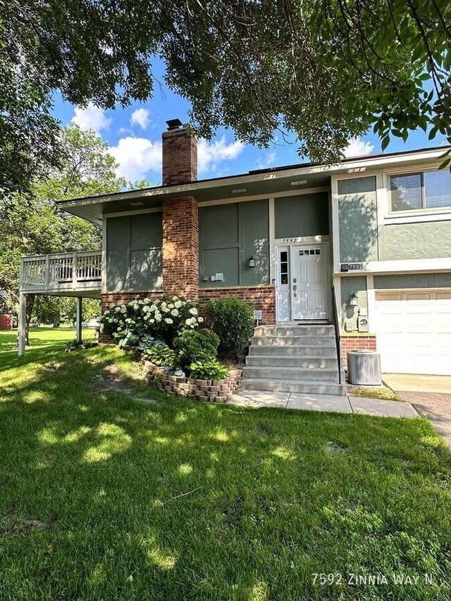 Building Photo - 7592 Zinnia Way N
