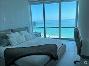 Building Photo - 17121 Collins Ave