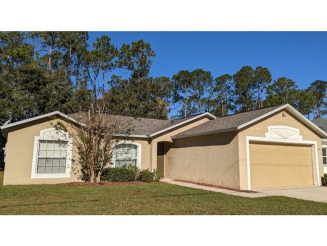 Building Photo - 4 Bedroom House Palm Coast, FL