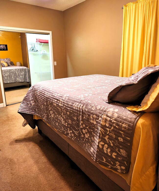 Bedroom with closet - 9015 Racine Rd