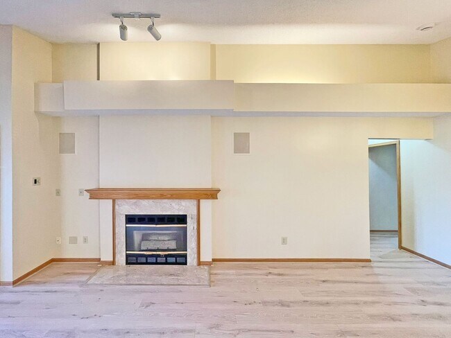 Building Photo - Luxury Maintenance-Free **One-Level Living** on Pond, Fireplace, Great Room, Primary Suite, Offic...