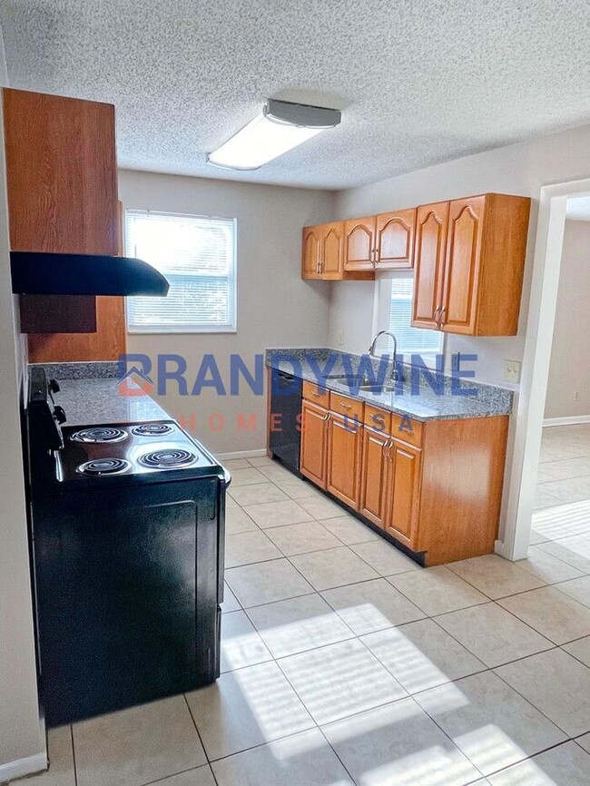 Building Photo - 50% OFF! No Application Fees - Move-in by ...