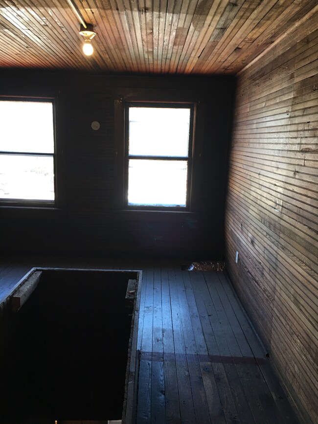 This is a bonus room on the 3rd floor. Great for storage! - 1919 Central Ave