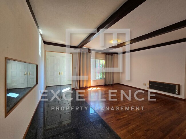 Building Photo - Spacious 3/2.25 Home with Large Yard, Pool...