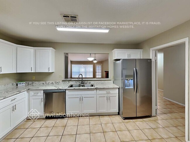 Foto del edificio - 7748 W Cherry Hills Dr