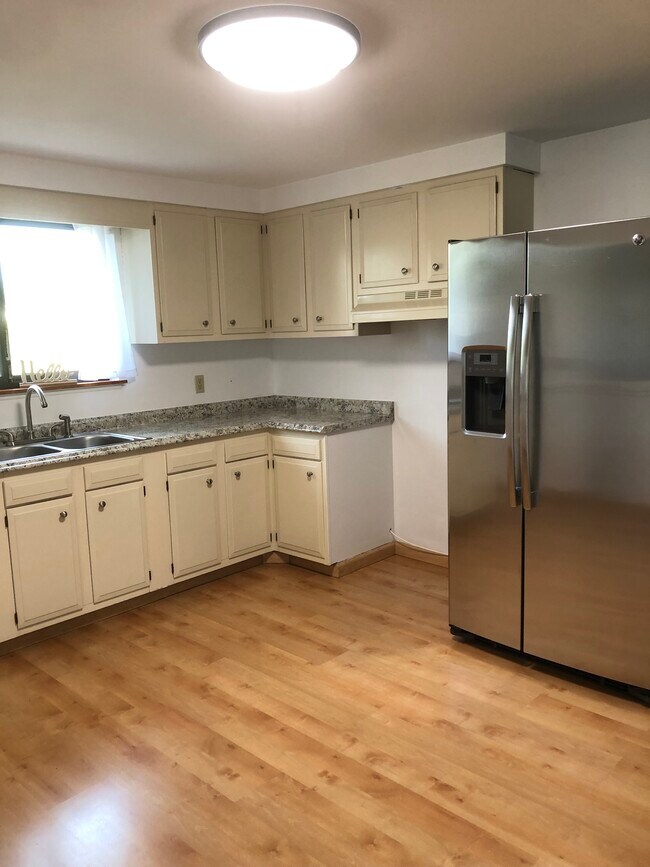 Kitchen stainless steel fridge and stove to come - 47 Cloverleaf Ave