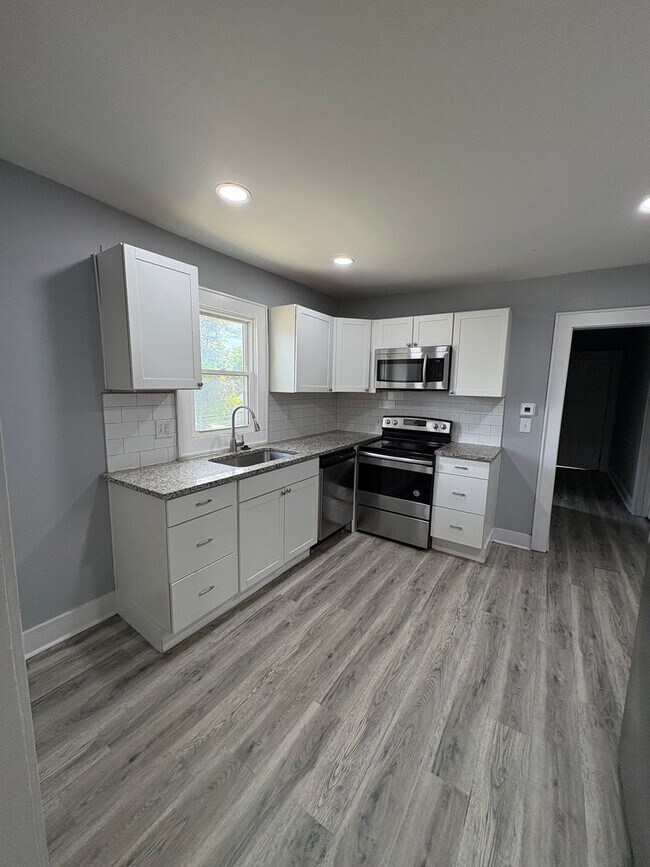 Foto del edificio - 411-413 S Glenwood Avenue