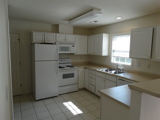 Building Photo - 5630 Regent Village Drive