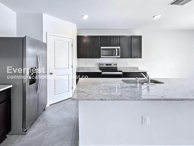Building Photo - 8332 Juning Cove
