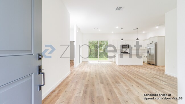 Building Photo - 8202 N Triana Dr