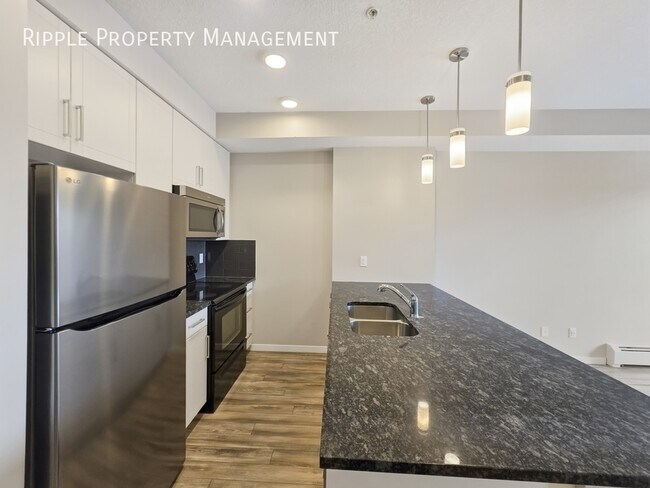 Building Photo - CHARMING 2 BEDS, 1 BATH CONDO | LAKESIDE LIVING IN MAHOGANY